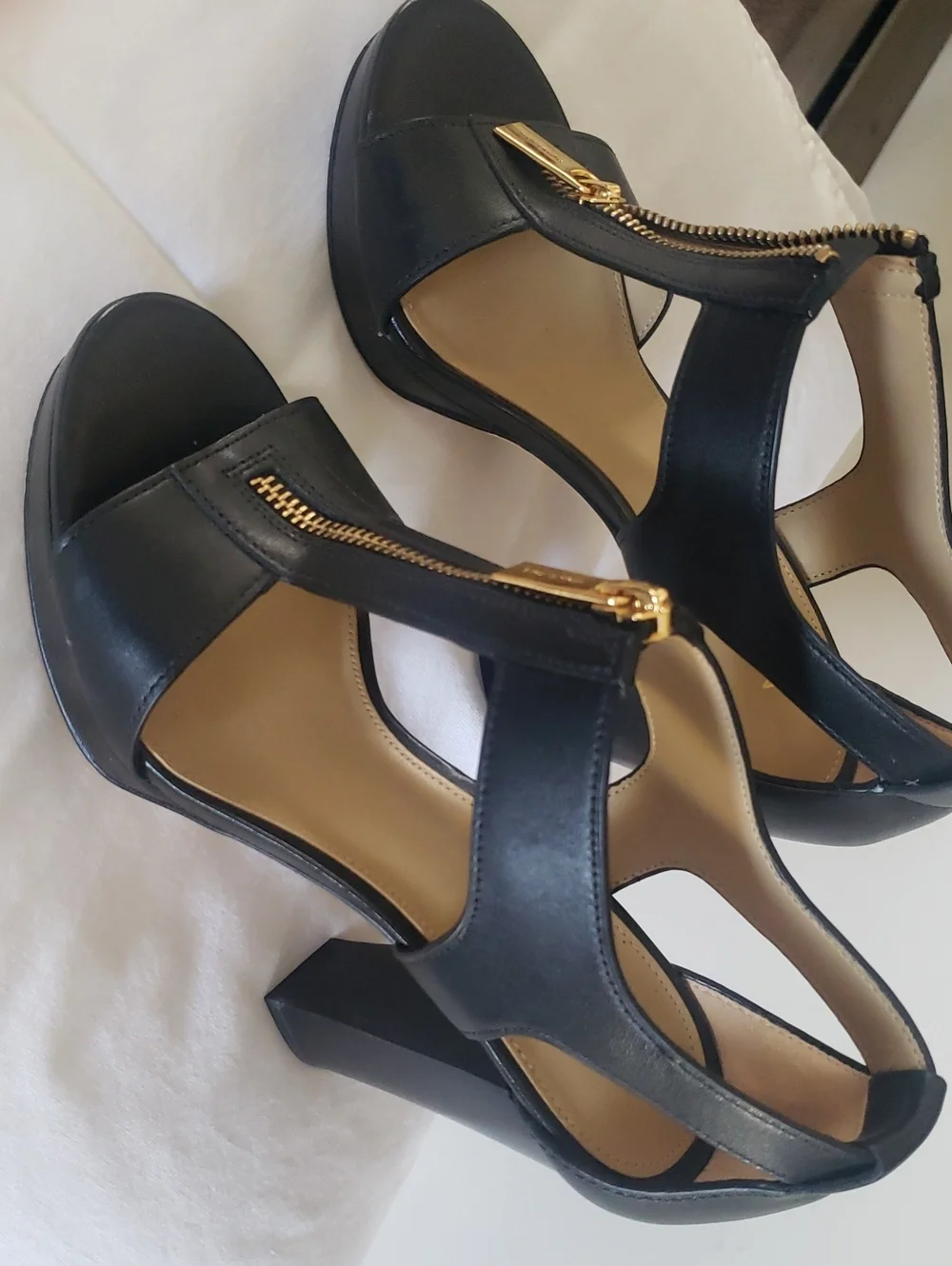 M8chael Kors Women’s Black Strappy Sandal with Gold Zip Accent